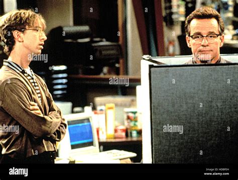 NewsRadio: A Hilarious Workplace Comedy Featuring Andy Dick and Phil Hartman!